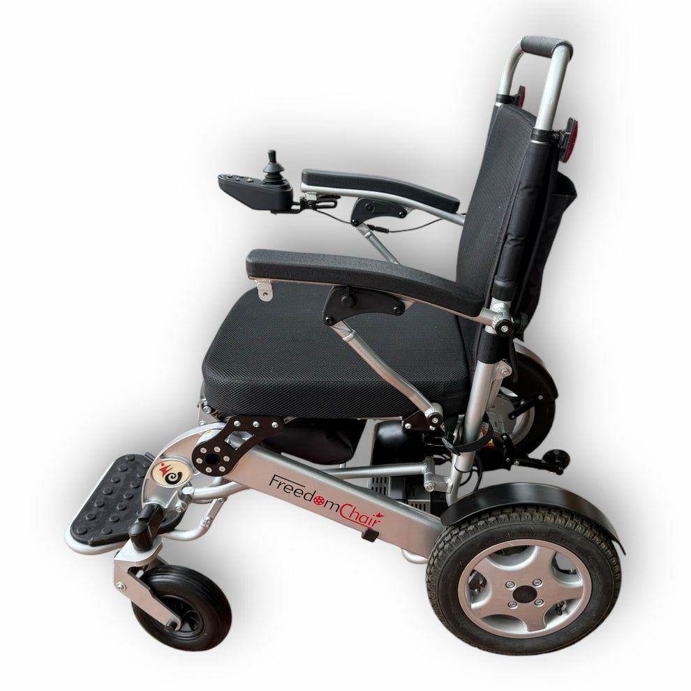 Freedom Powered Wheelchair - Used - Image 5