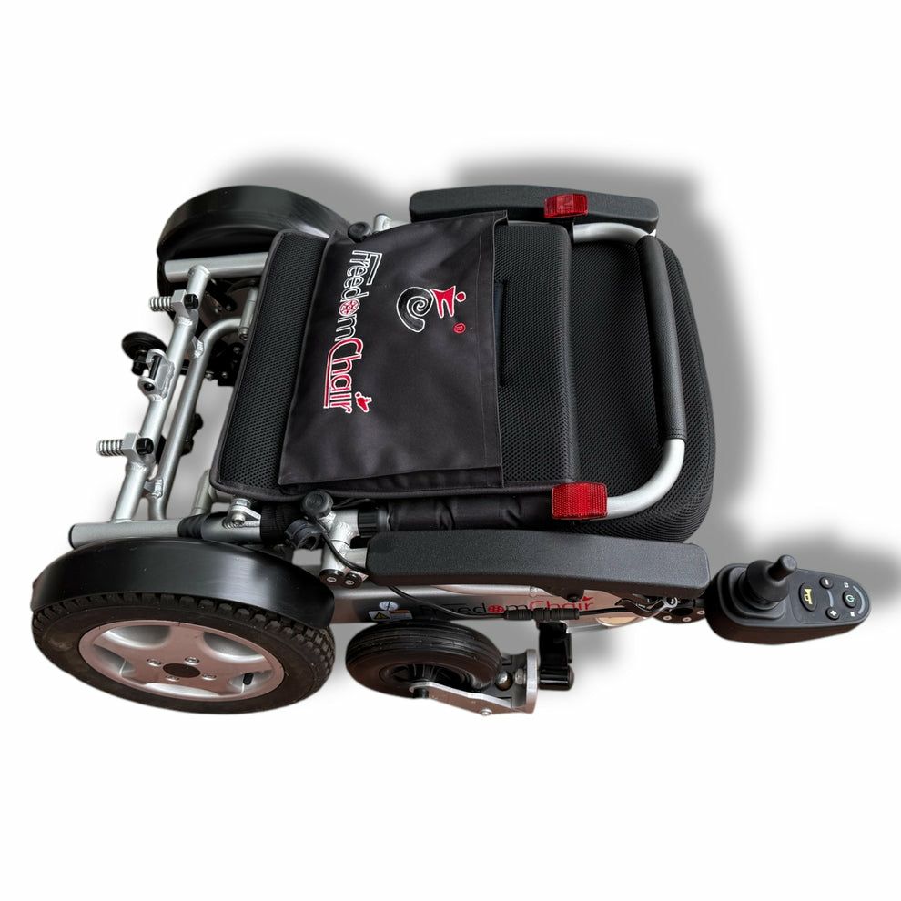 Freedom Powered Wheelchair - Used - Image 7